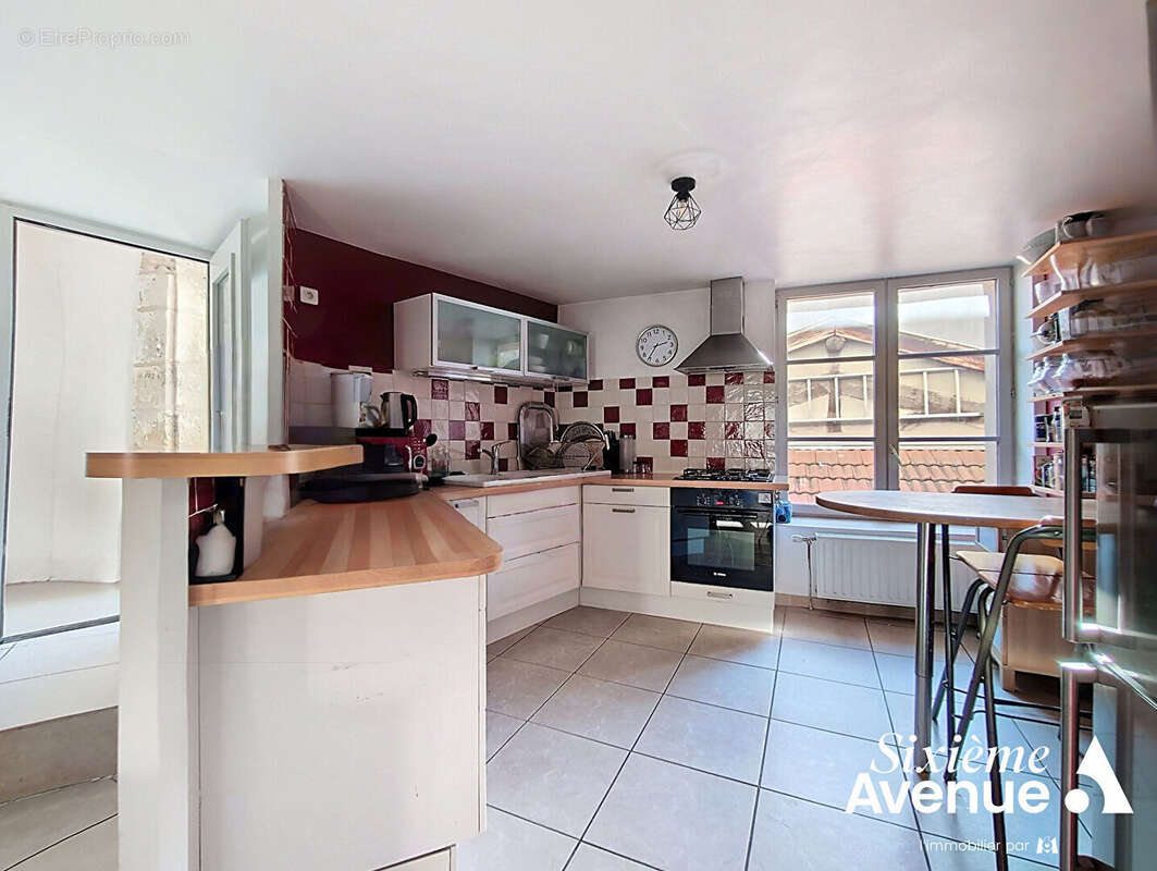 Maison à SAINT-SYMPHORIEN-D'OZON