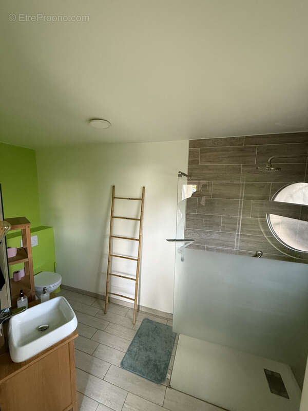 Maison d'architecte de 300m2 sur un terrain de 5.79 ares avec jardin et garage - photo 11