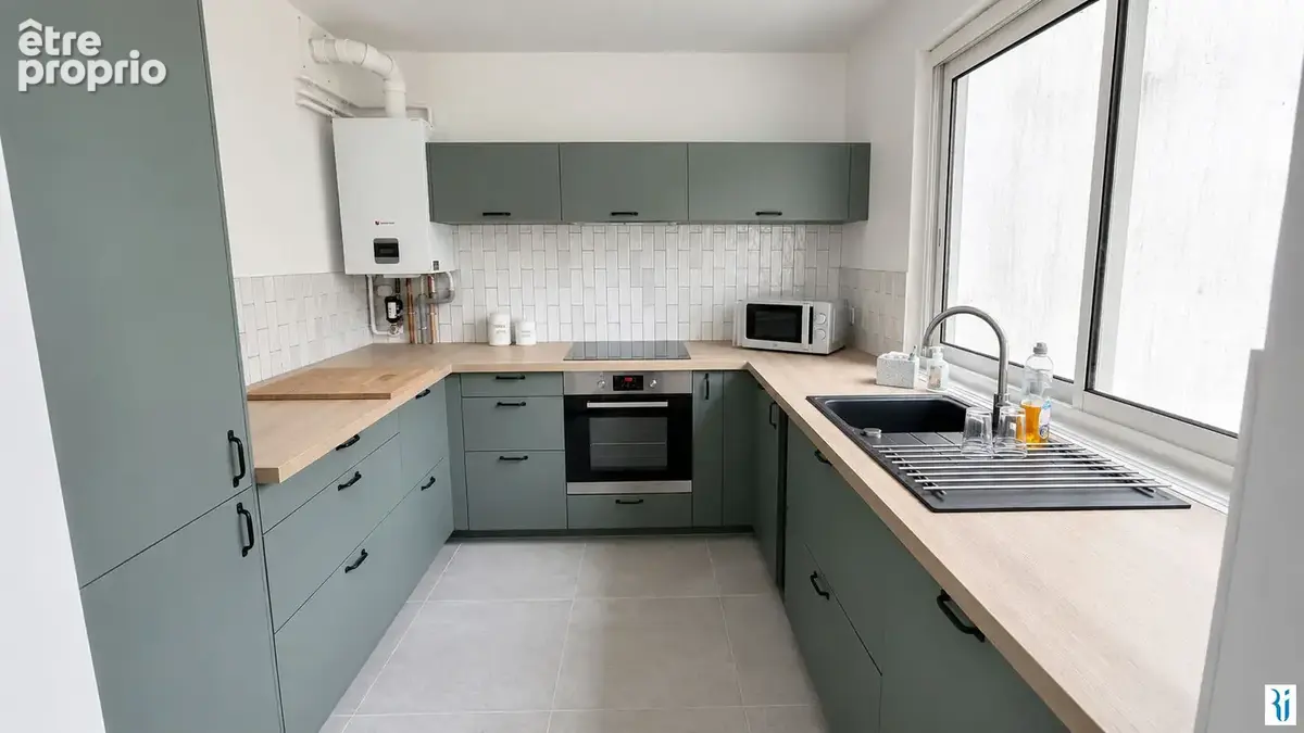 Appartement 4 pièces 86 m² à vendre à Bonsecours (76240) - photo 2