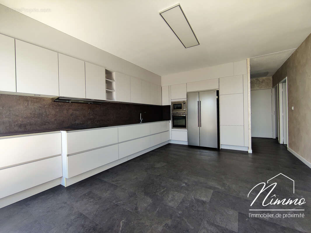 Nimes route duzes appartement t3 dernier etage terrasse garage ascenseur - photo 4