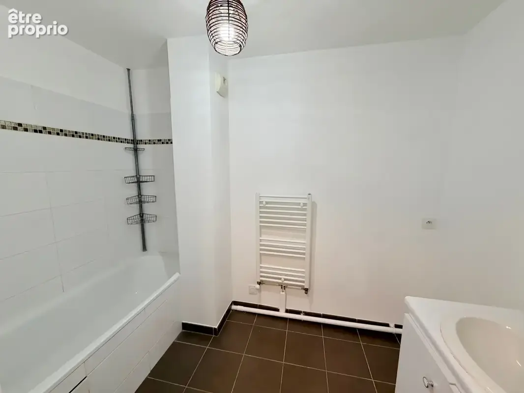Rue Étienne Dolet  Exclusivité — Appartement rénové en dernier étage avec balcon - photo 7