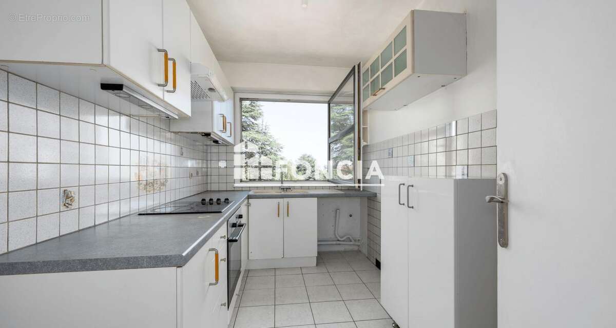 Appartement familial - centre-ville - photo 4