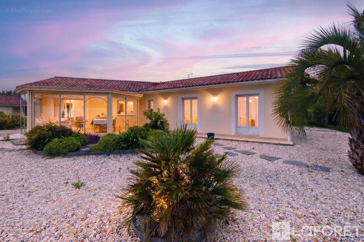 Maison familiale 4 chambres avec véranda, garage et extérieur paysager - Biscarrosse Bourg, secteur calme - photo 13