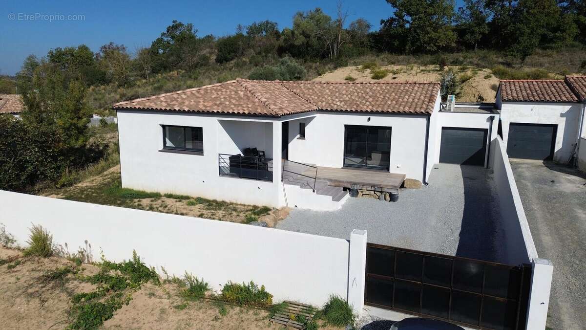 Maison à COUFFOULENS