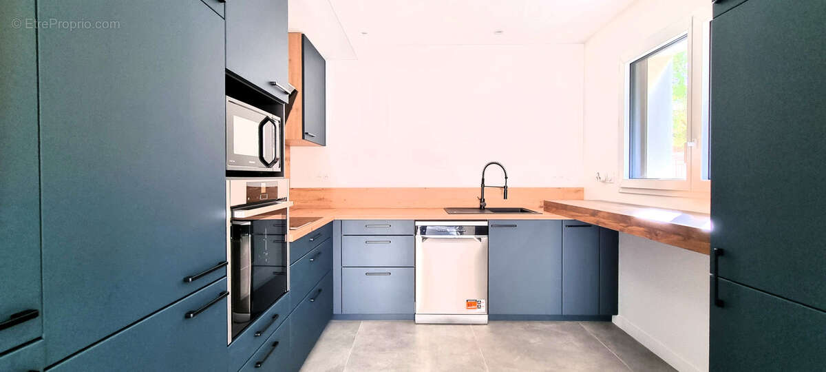 Belle maison neuve dans un cadre verdoyant - photo 4