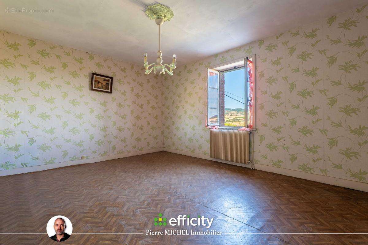 Maison 4 pièces 113 m² à vendre à Chevinay (69210) - photo 11