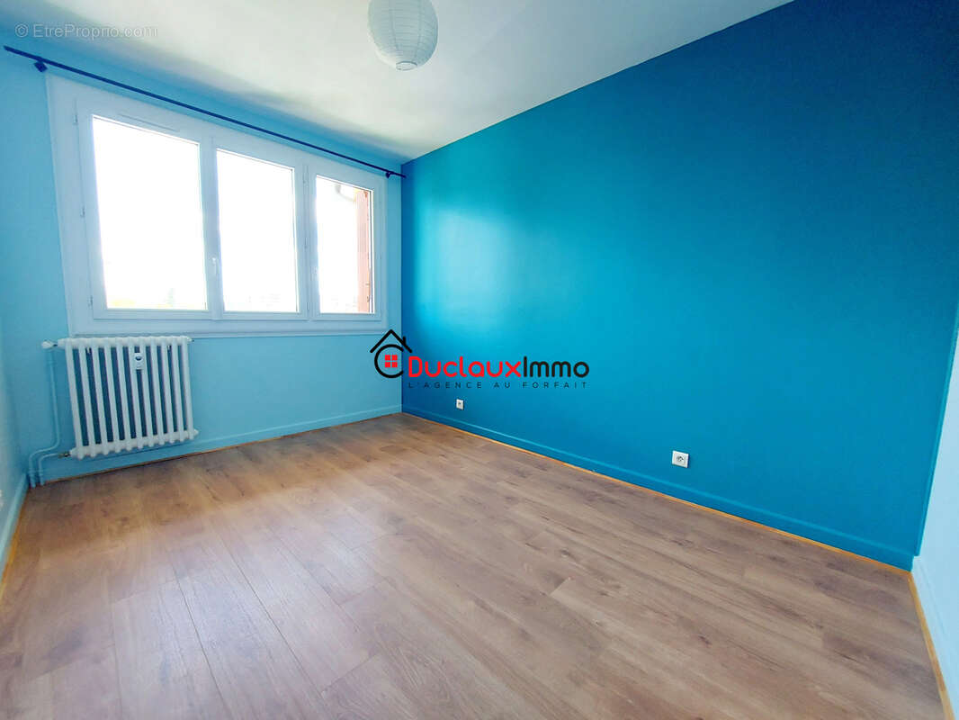 Appartement T3 avec balcon, cave & garage - photo 4