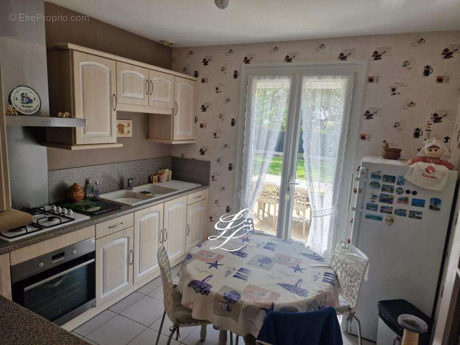 Maison à SAVIGNE-L'EVEQUE