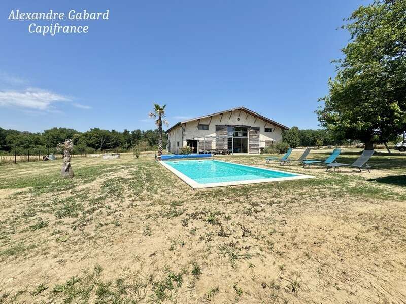 SUD REOLAIS - Maison en pierre rénovée - 7 chambres - Terrain 5 000 m² - Piscine - Dépendances - photo 22