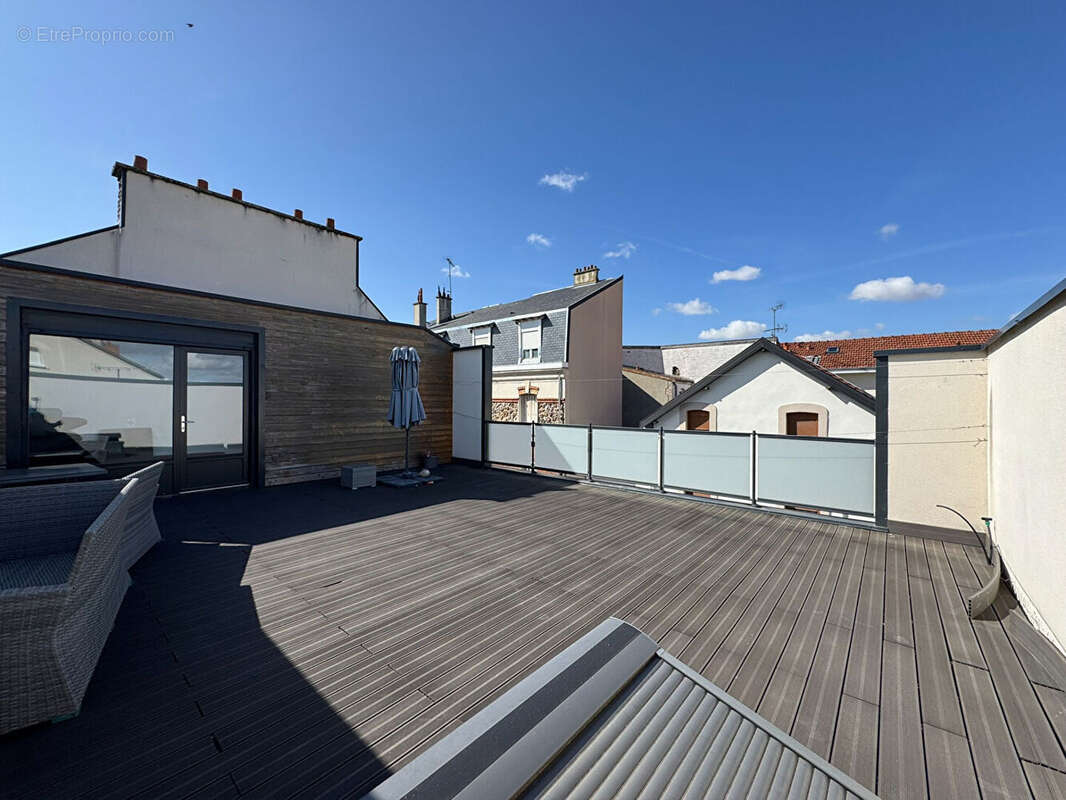 Maison récente avec terrasse et garage - proche centre-ville - photo 3
