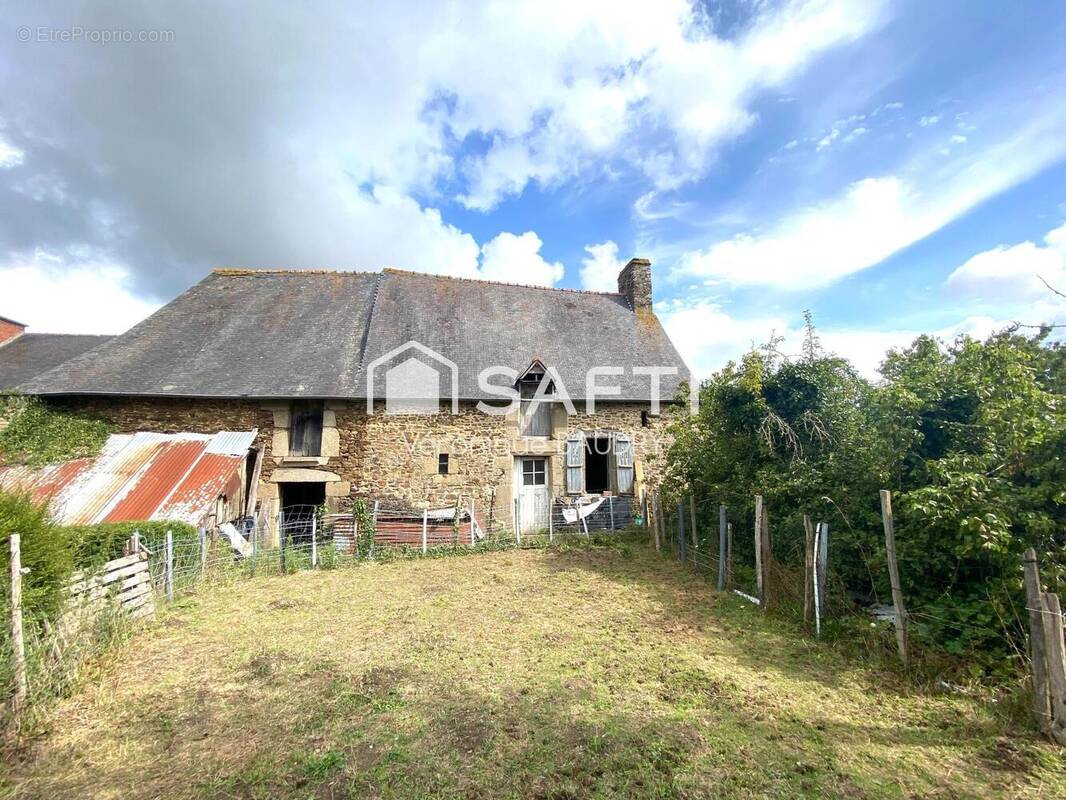 Photo 1 - Maison à BAZOUGES-LA-PEROUSE