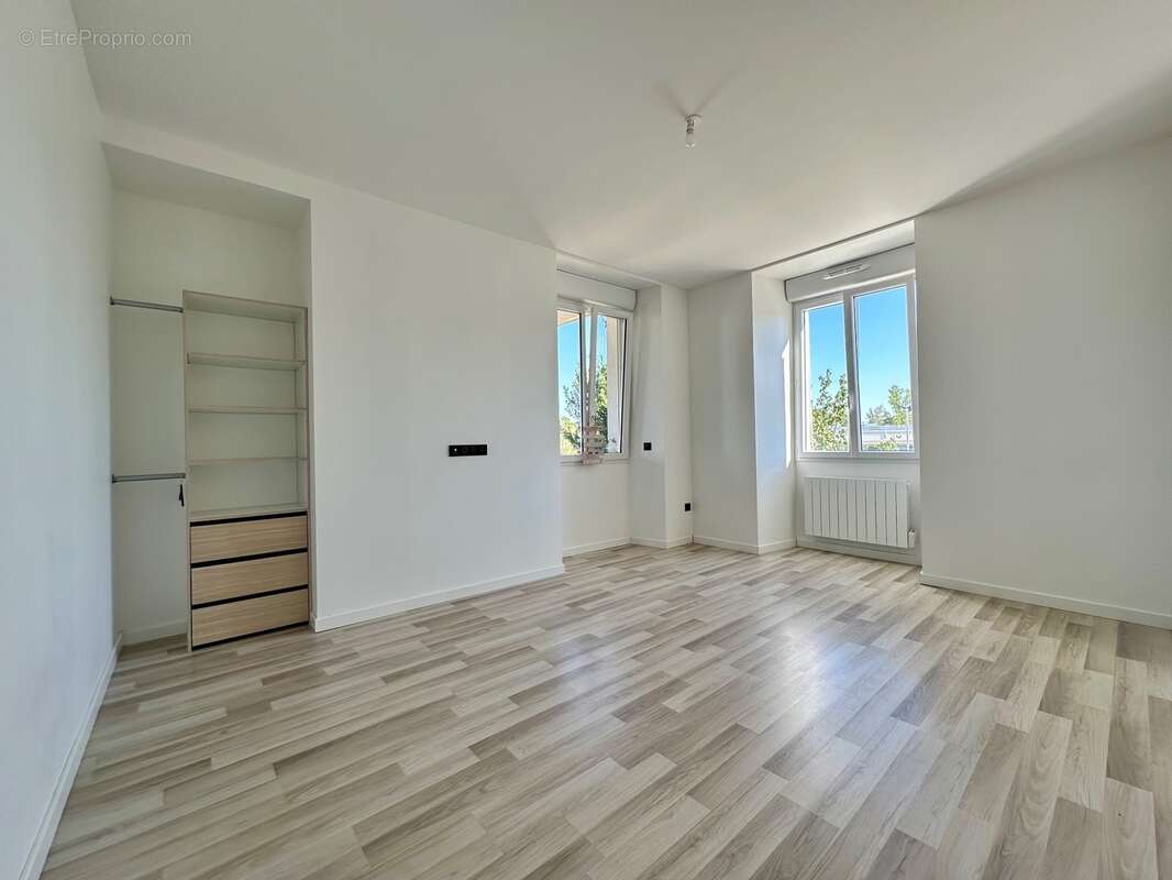 Duplex 100 m2 en rez-de-jardin à vendre 3 pièces FORGES LES BAINS (91) - photo 6