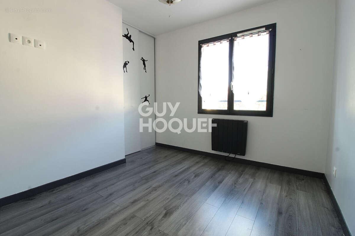 Maison à GUIGNES