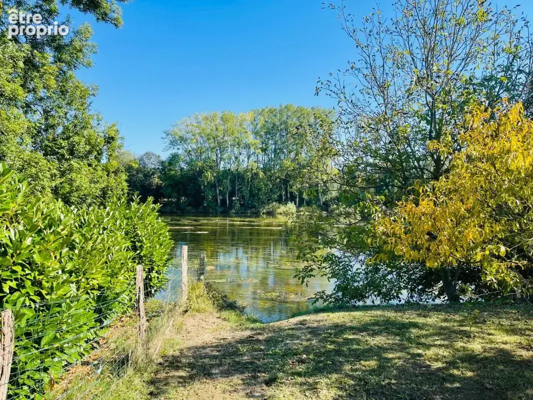 Terrain à vendre * Au bord de la Vienne * Un Véritable Havre de Paix * Terrain Arboré de 1 269 m²  CHAUVIGNY (86) - photo 5
