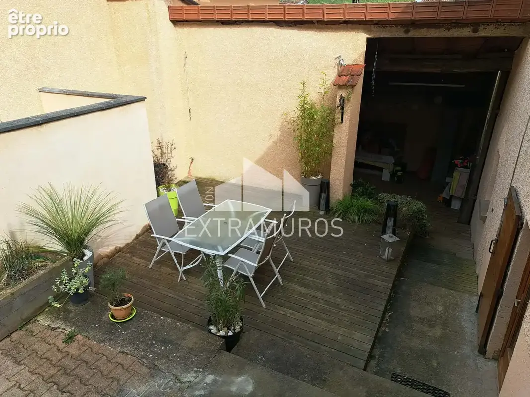 A vendre au coeur du bourg de courzieu maison ancienne renovee avec terrasse + annexes - photo 7
