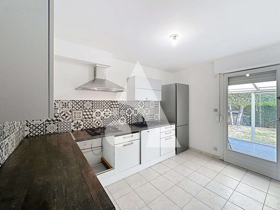 Maison à AULNOY-LEZ-VALENCIENNES