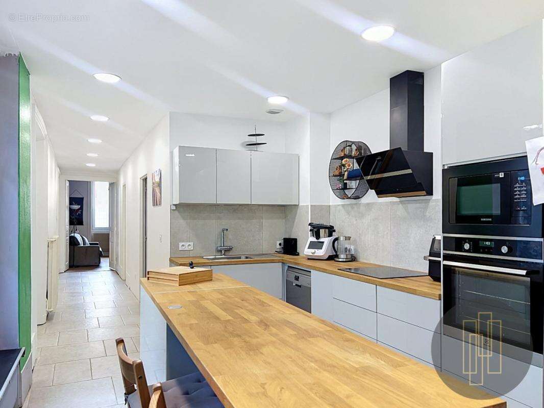 Exclusivité - Rue Nationale - Appartement de type 4  rénové de 108.83 m² - photo 2