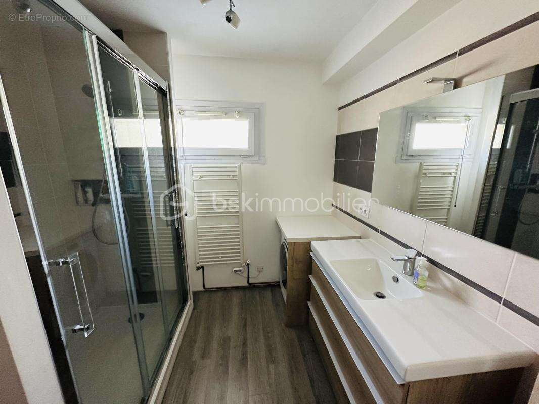 Appartement en rez de jardin avec garage + place de parking privative - photo 9