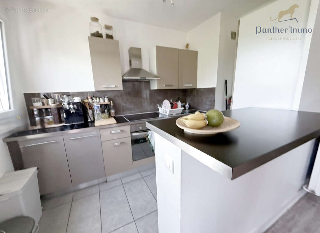 Appartement T2 vue sur Tours, 44m2, cave, parking, très calme. - photo 3