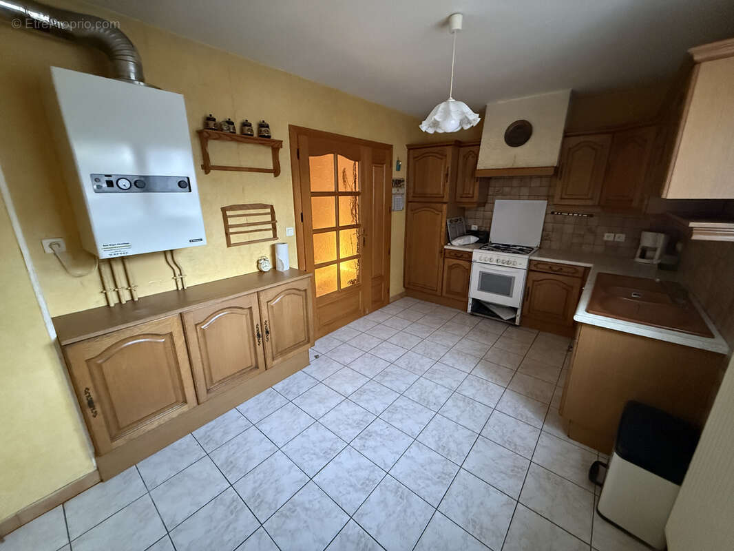 Maison 6 pieces de 102 m2 avec 5 chambres (quartier huchet) - photo 5