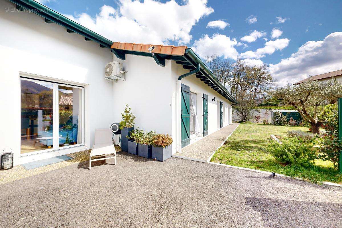 Maison T5 de plain pied 154 m² avec DPE A - photo 2