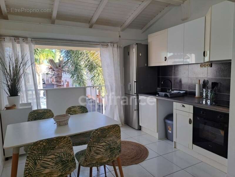 Duplex au cœur de Saint-François – Élégance, volume et douceur de vivre - photo 3