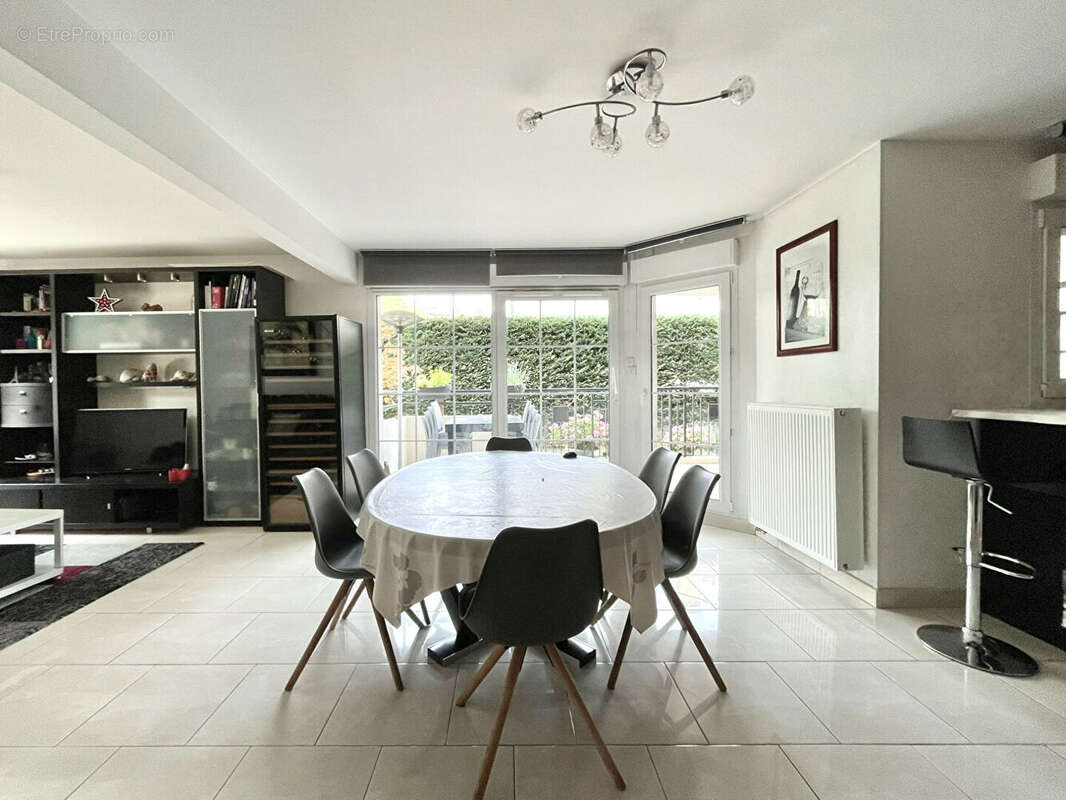 Appartement en rez-de-jardin avec garage, parking, cave, terrasse et jardin - photo 7