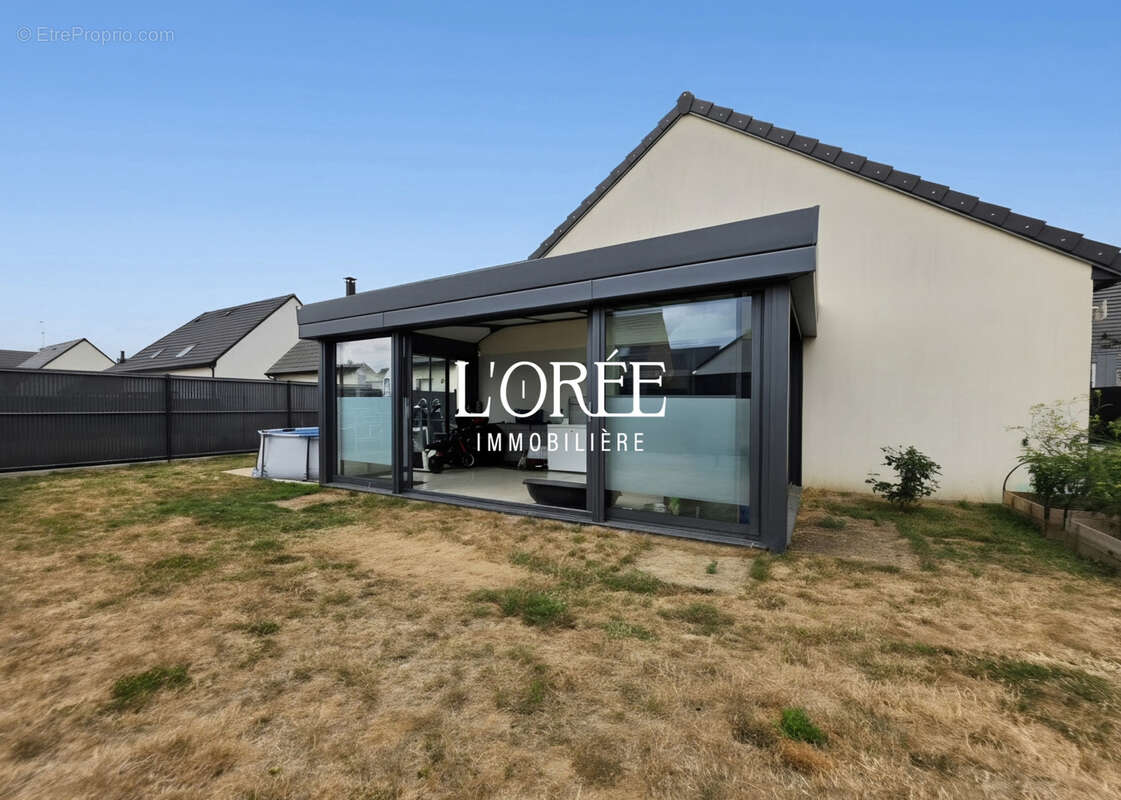 Plain pied individuel - construction recente - 3 chambres -  veranda  - jardin - photo 10
