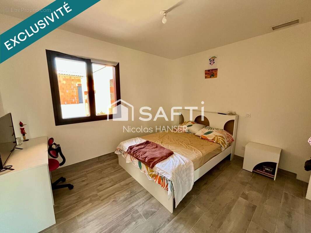 Photo 7 - Maison à SAINT-JULIEN-LES-ROSIERS