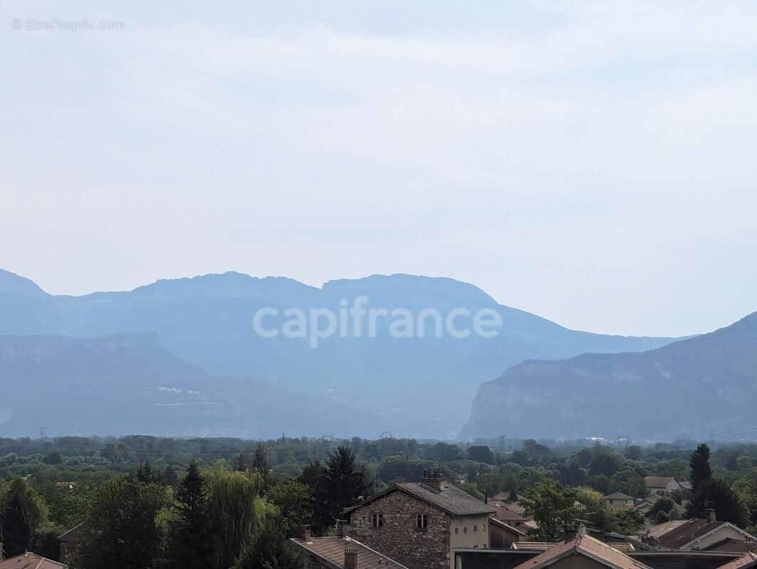 Appartement à vendre 4 pièces TULLINS (38) -  62.79 m² - Dernier étage - 2 chambres- 2 caves et stationnement au bas de l'immeub - photo 12