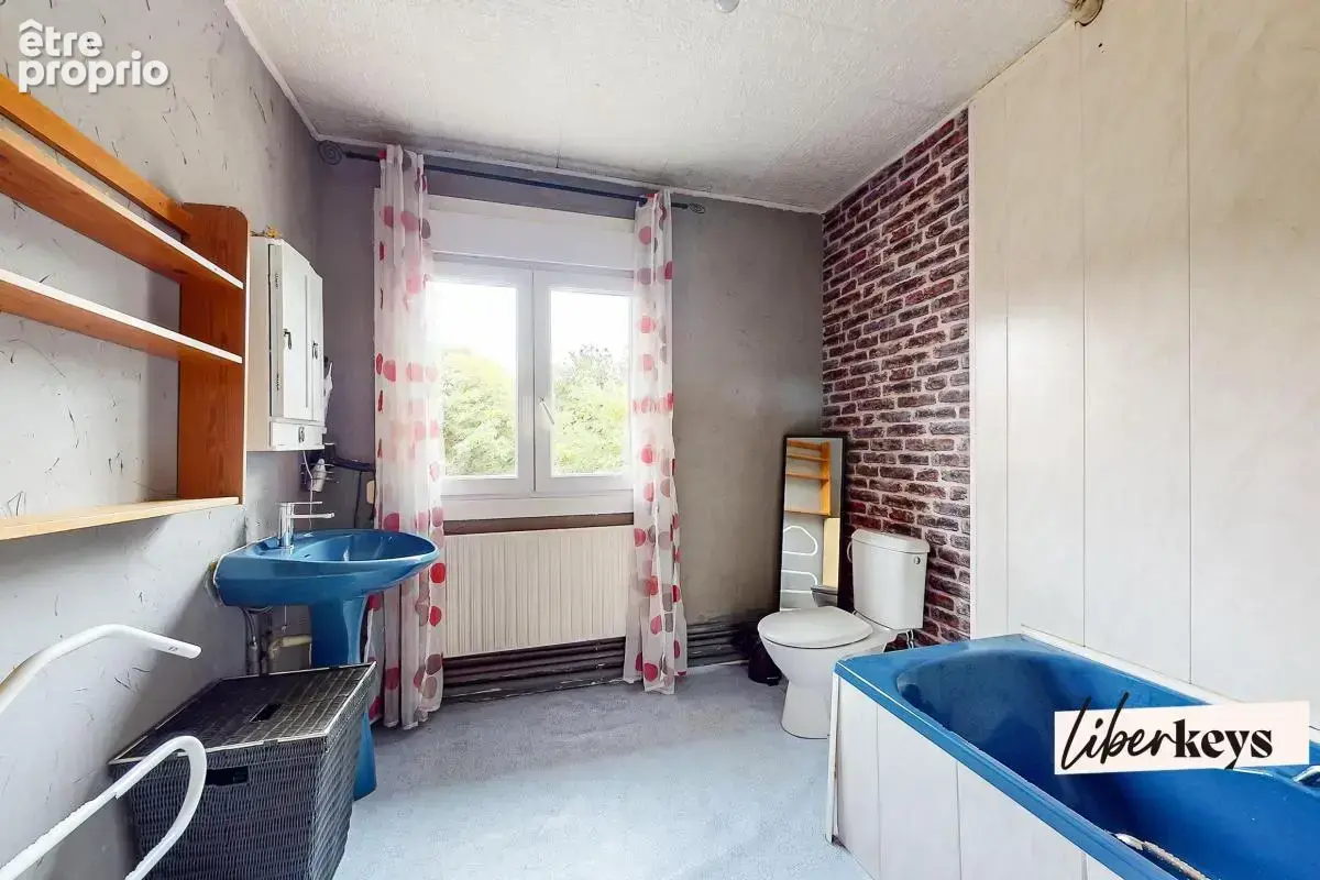 Maison de 120m² avec 4 chambres, jardin, garage, et cave - photo 11