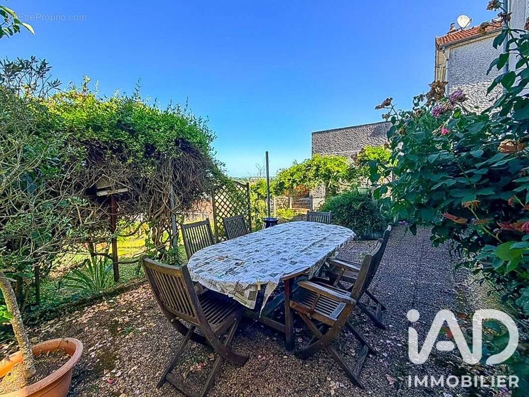 Photo 2 - Maison à SAINT-LEONARD-DE-NOBLAT