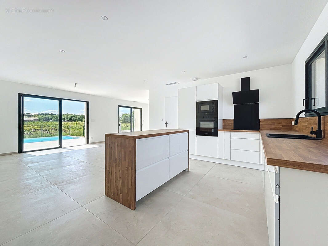 Maison à ARPAILLARGUES-ET-AUREILLAC