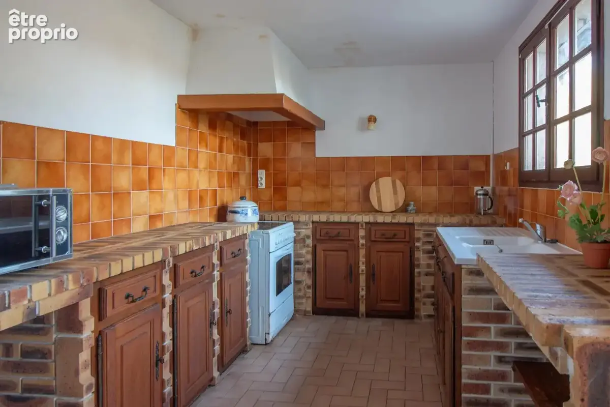 Maison de village avec jardin, garage et potentiel - photo 4