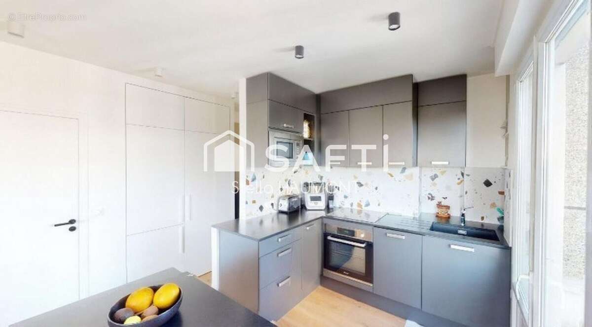 Photo 5 - Appartement à COURBEVOIE