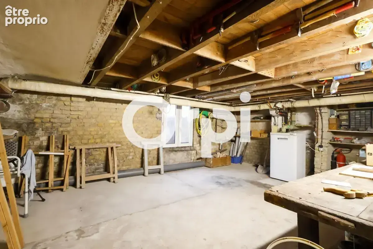 Maison 3 chambres, grenier aménageable, jardin, cave et garage à ROSENDAËL (59240) - photo 11
