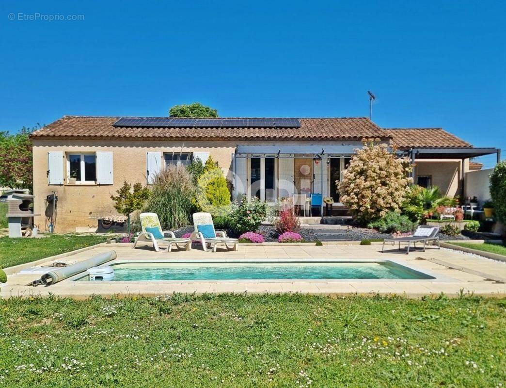 Maison à SAINT-JULIEN-LES-ROSIERS