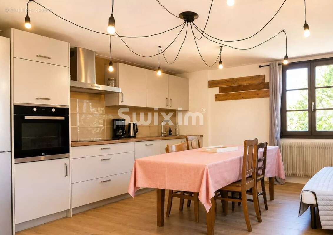 Appartement 4 pièces, trois chambres, combles et stationnement couvert - photo 6
