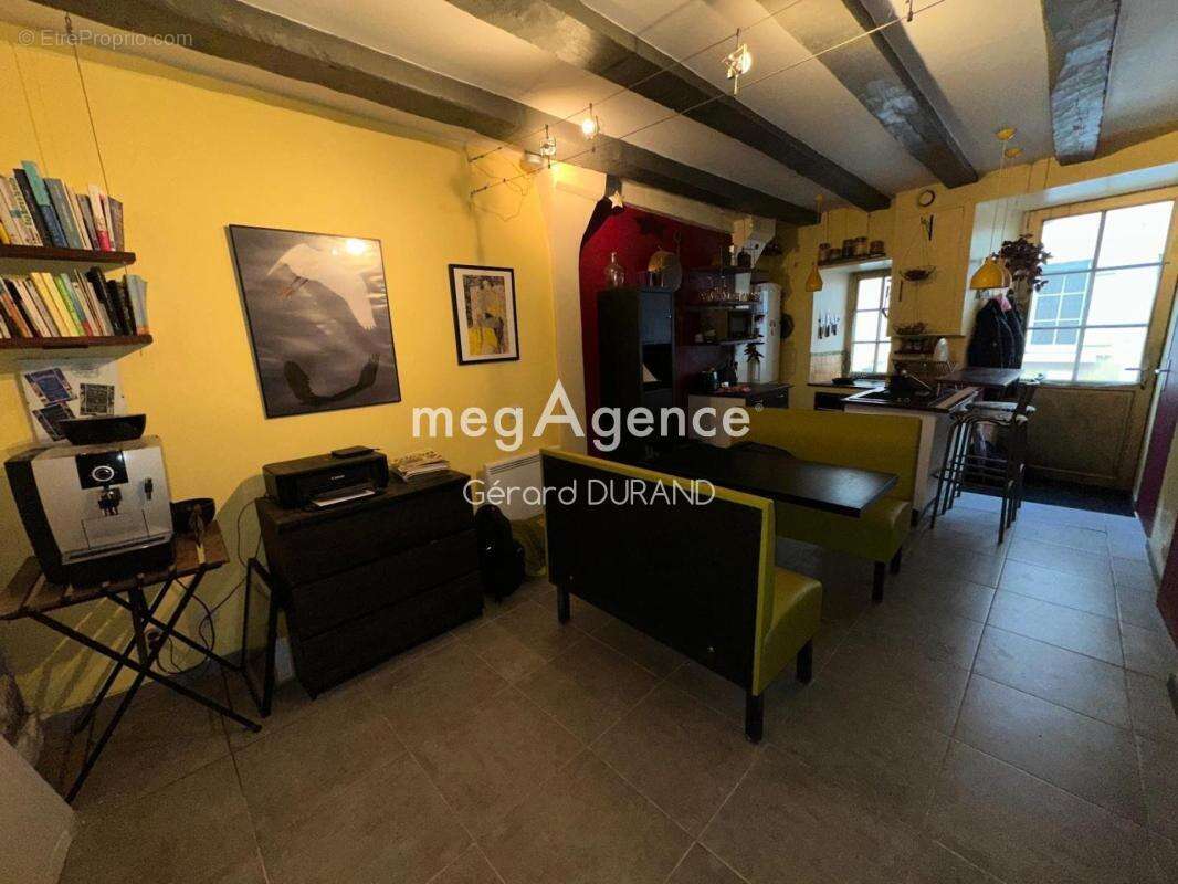 Maison authentique en pierres et poutres apparentes contenant 3 appartements - photo 5