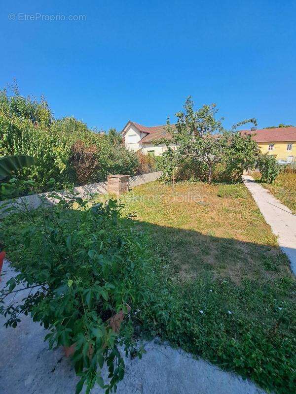 Maison de ville avec jardin, véranda et fort potentiel – À deux pas du centre-ville ! - photo 2