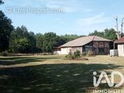 Photo 1 - Maison à ESCOURCE