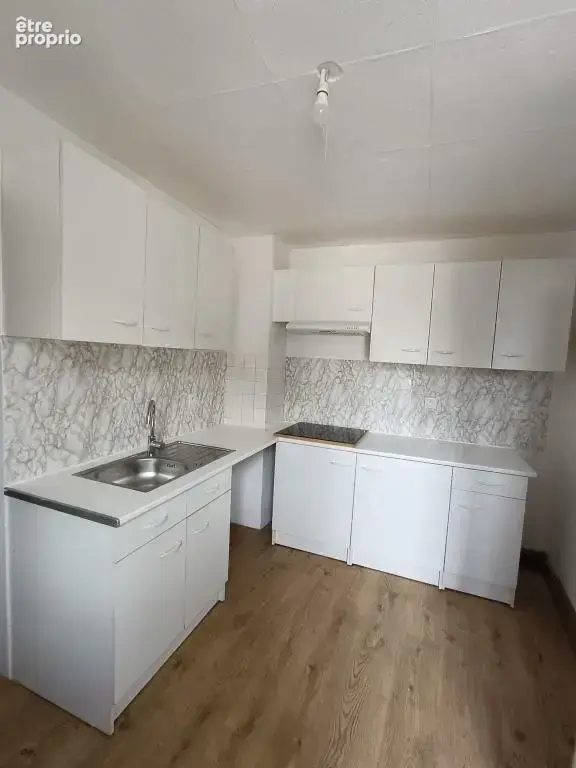 Immeuble en centre-ville à usage de commerce et d'habitation (loués) - photo 14