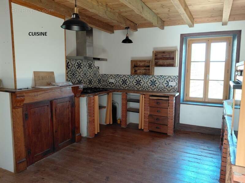 Grande maison rénovée de 220 m² avec atelier, terrasse panoramique et verger – Mourjou (Puycapel  cantal) - photo 15