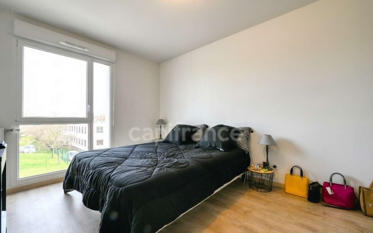Appartement T3 en résidence sécurisée - photo 7