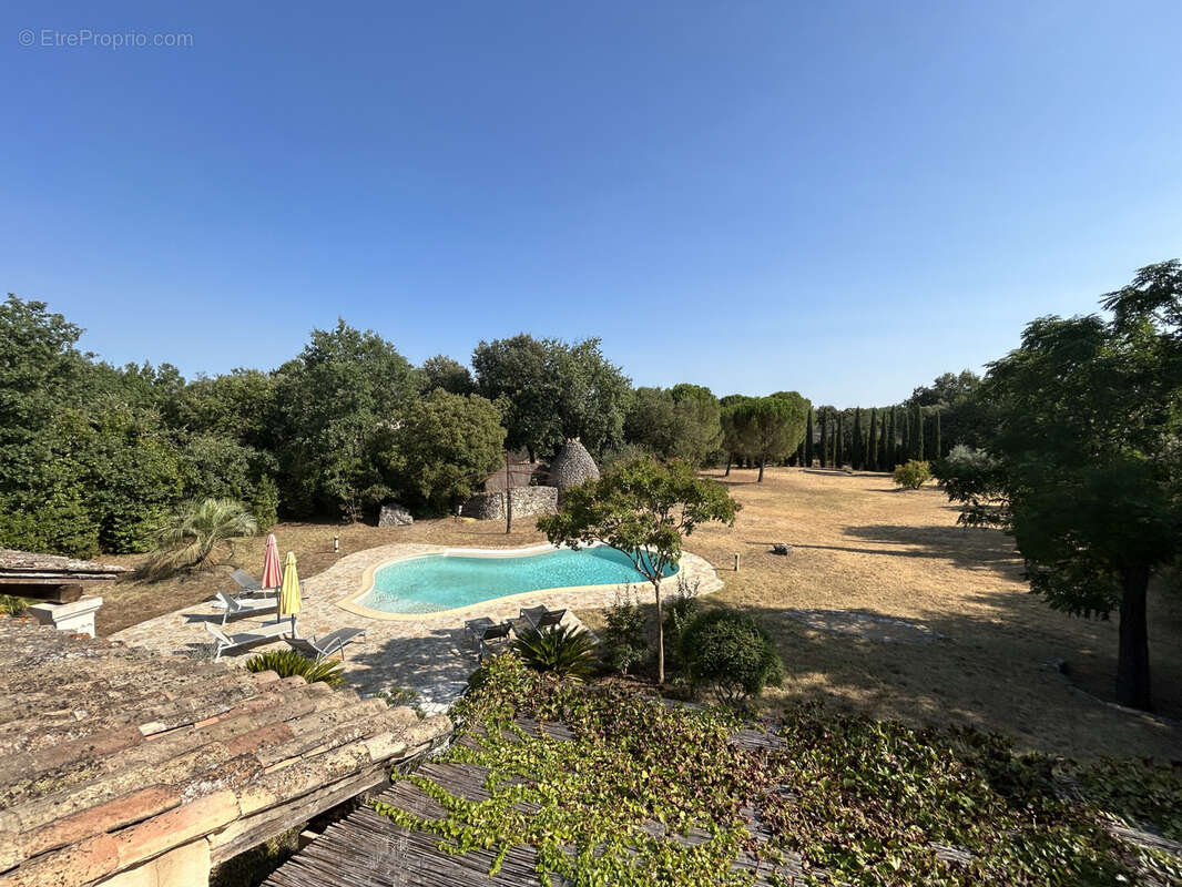 A 3 km d'Uzès, belle bastide sur 4200 m2 de terrain avec piscine. - photo 18