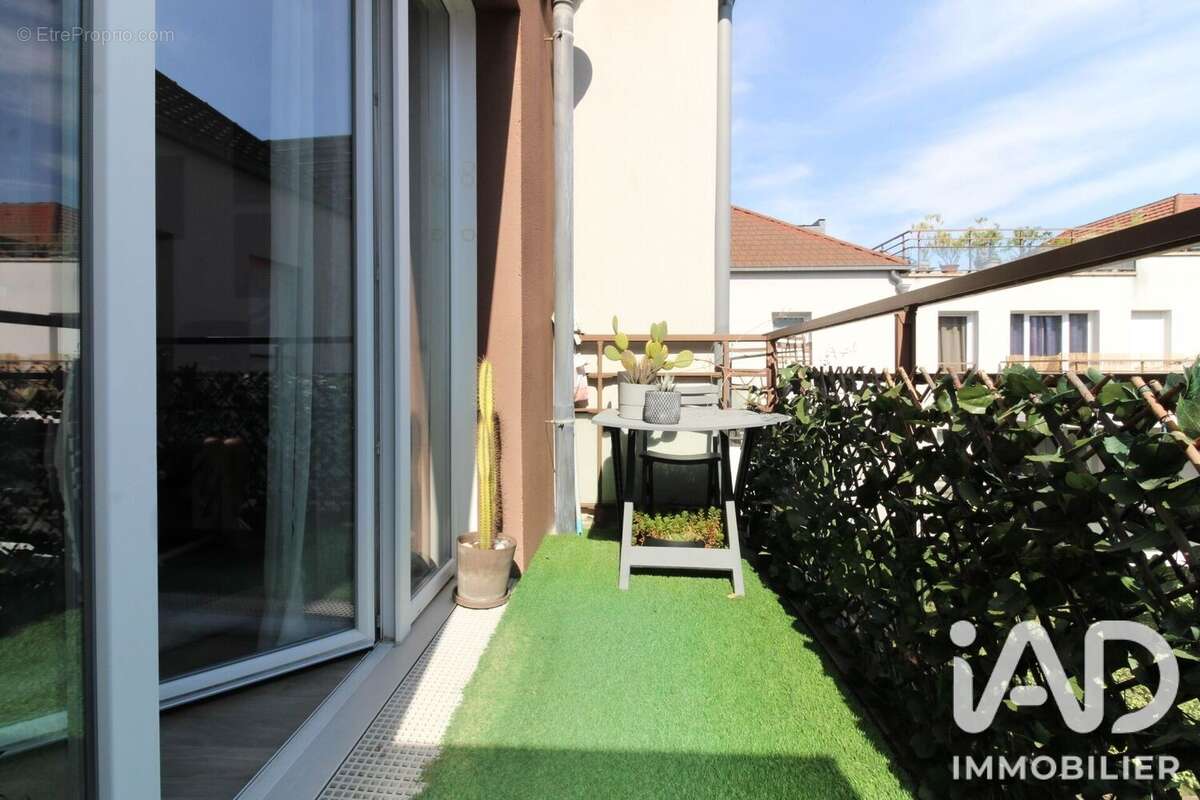 Photo 2 - Appartement à LES MUREAUX