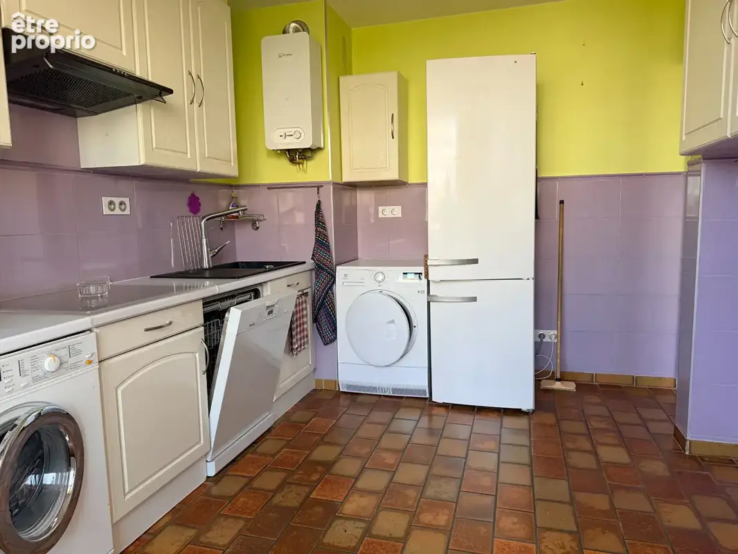 Appartement T4 de 71 m² hab au 5ème et dernier étage avec asc, garage et balcon - photo 9