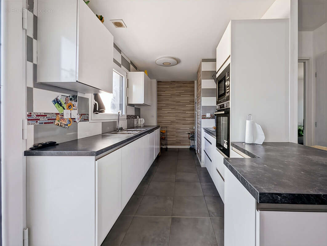 A vendre  SAINT AUBIN D AUBIGNE  maison familiale 4 chambres - photo 5