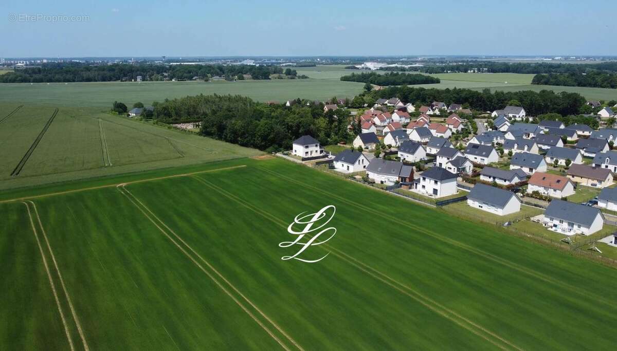 Terrain à GUICHAINVILLE