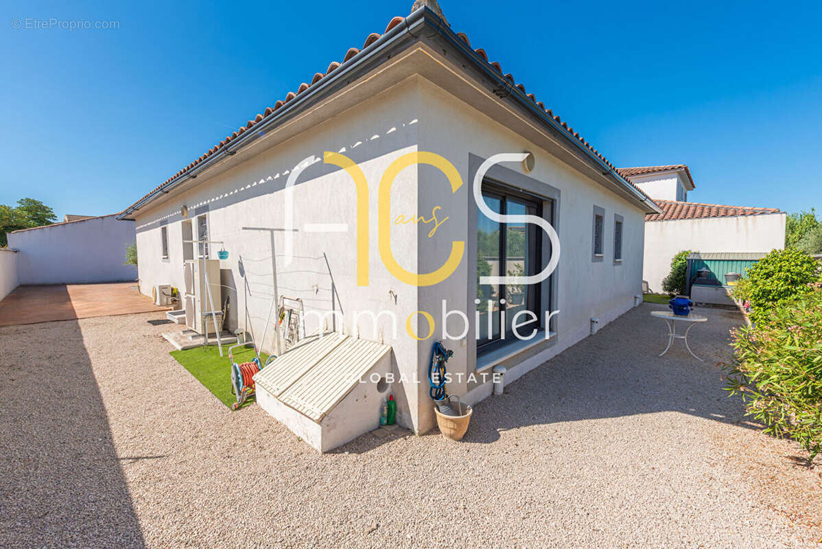 Achat Vente Maison Gignac-la-Nerthe  4 pièces 114m2 Jardin Garage - photo 4